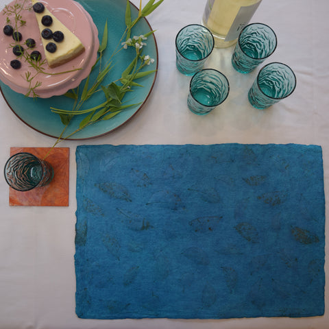 turquoise recycled paper tablemat with benjamin leaf imprint