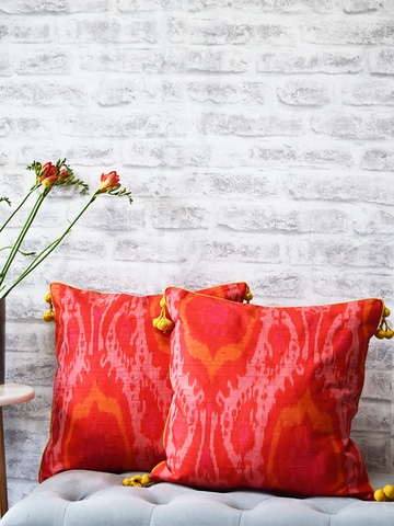 Gulmohar, Orange Raw Silk Ikat Cushion Covers with yellow tassels