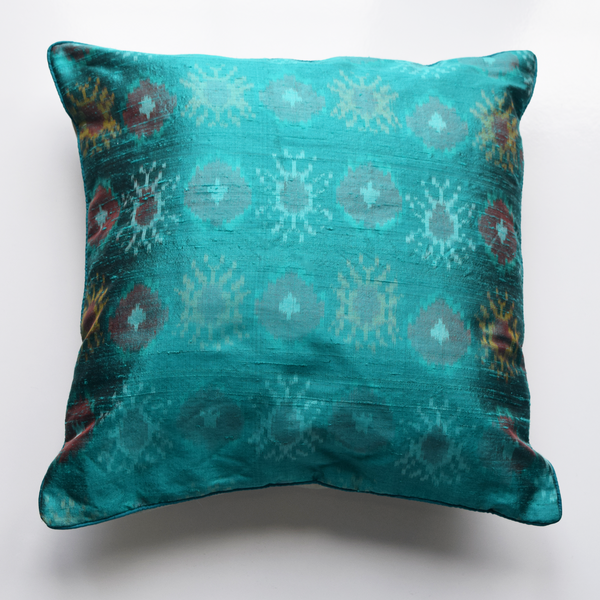 Firozi Turquoise Blue Silk Ikat Cushion Cover on plain white background