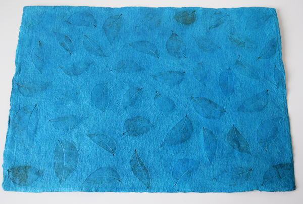 turquoise tablemat with benjamin leaf imprint