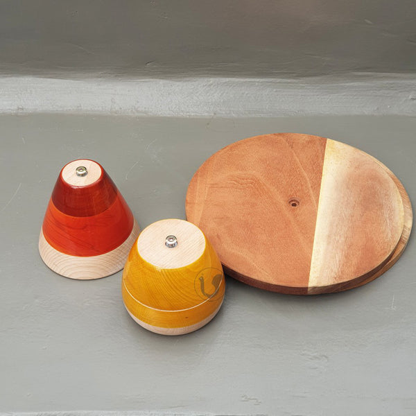 red and yellow wooden cake stands