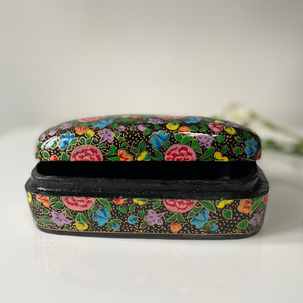 Black paper mache box with multicoloured flowers