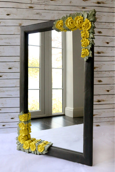 Side view of Charcoal frame with yellow roses