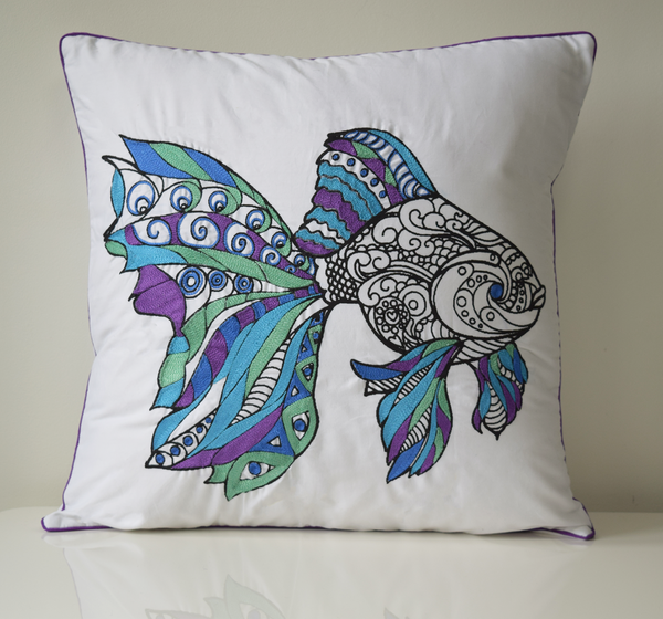 Fish cushion cover in mandala pattern with blue, purple and green embroidery
