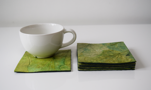 Green handmade paper coasters with cup