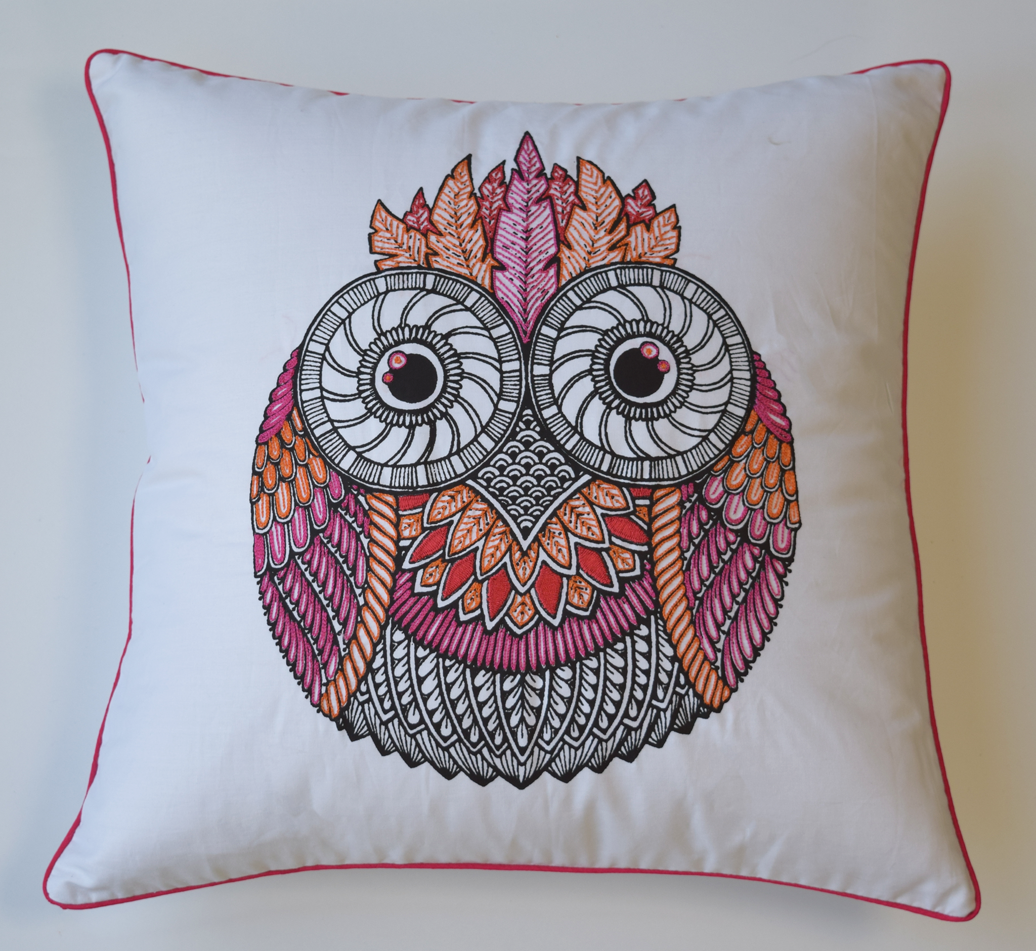 White Owl cushion cover in pink and orange embroidery with pink piping