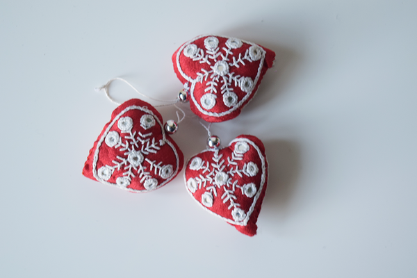 Red heart shaped Christmas decoration with white embroidery and mirror work -set of 3