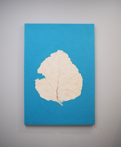 Turquoise wall poster with teak leaf imprint