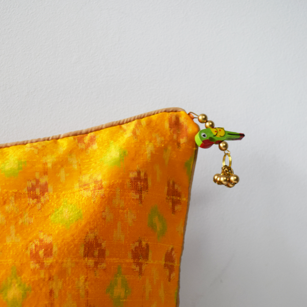 Yellow Silk Ikat Cushion Cover with Green Wooden Bird Tassel