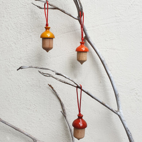 yellow, orange and red acorn Christmas ornaments