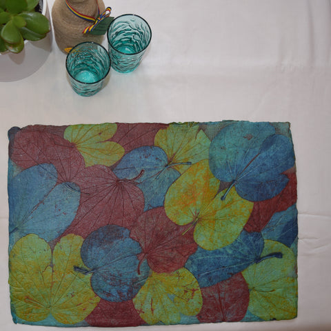 blue, green and red hand made paper tablemat