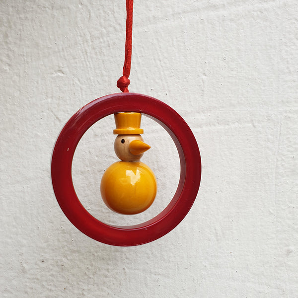 red-yellow snowman ornament