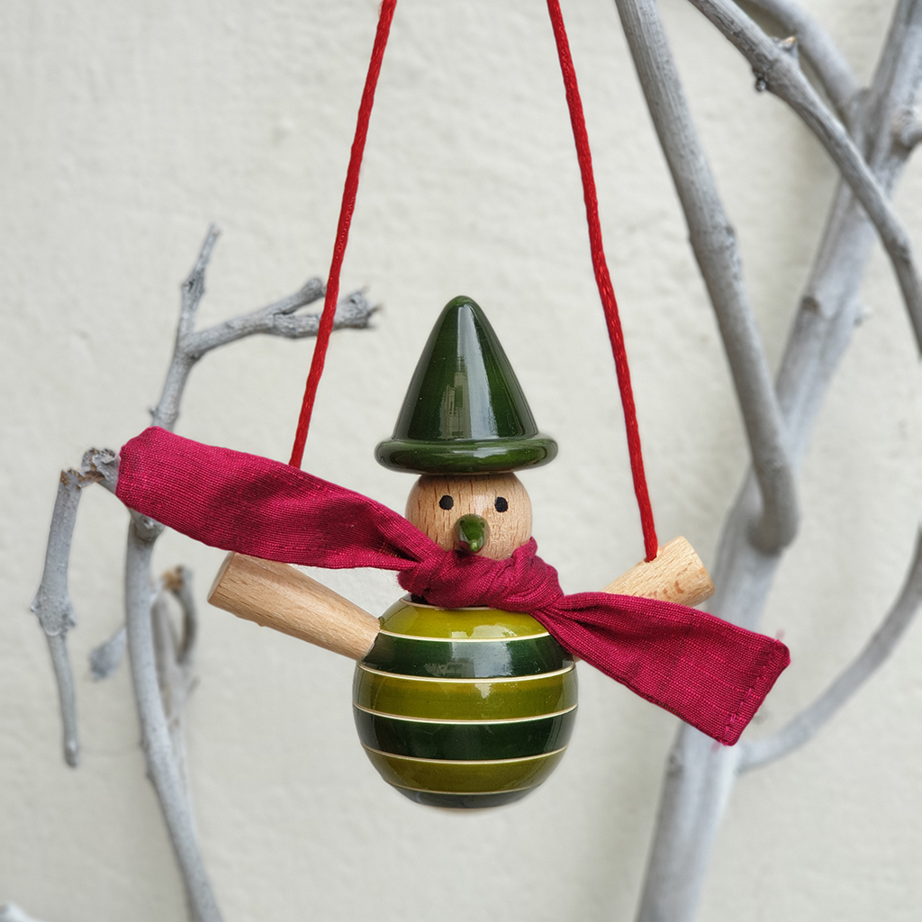 green snowman on a swing ornament