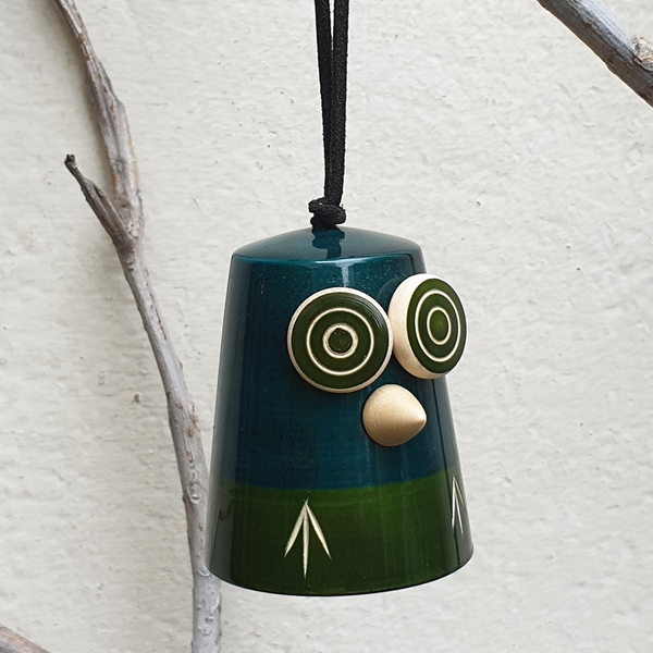 blue-green wooden owl bell