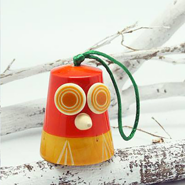 yellow-orange wooden owl bell