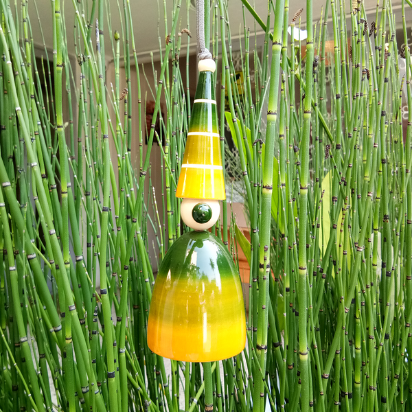 yellow-green wooden gnome bells
