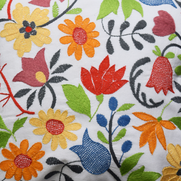 Embroidered cushion cover in mutlicoloured vibrant floral patterns