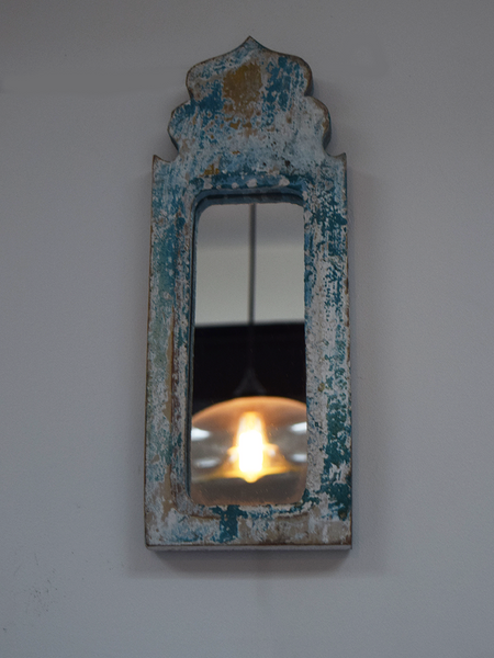 distressed blue dome shaped mirror