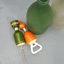 green and orange wooden cork and bottle openers