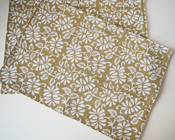 brown table mats with white floral block print
