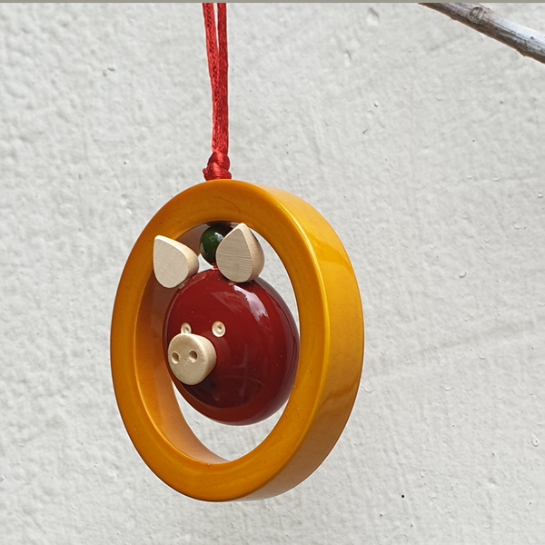 Yellow and red Oink-in-a-ring Christmas ornament