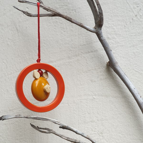 Orange and yellow Oink-in-a-ring ornament